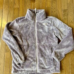 The North Fact full zip girl’s Osolita jacket. Large 14/16.  Dusky purple color.